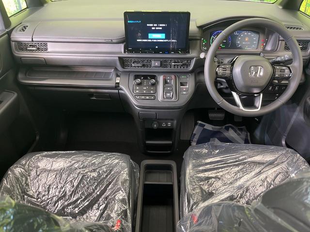 ステップワゴン ｅ：ＨＥＶスパーダ　登録済未使用車　両側電動ドア　純正１１型ナビ　バックカメラ　ホンダセンシング　アダプティブクルーズ　電動リアゲート　ハーフレザーシート　シートヒーター　コーナーセンサー　スマートキー　ＬＥＤヘッド（2枚目）
