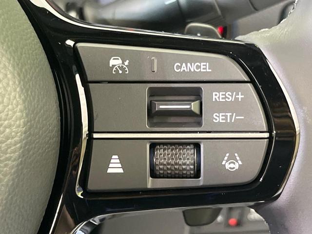 ステップワゴン ｅ：ＨＥＶスパーダ　登録済未使用車　両側電動ドア　純正１１型ナビ　バックカメラ　ホンダセンシング　アダプティブクルーズ　電動リアゲート　ハーフレザーシート　シートヒーター　コーナーセンサー　スマートキー　ＬＥＤヘッド（6枚目）