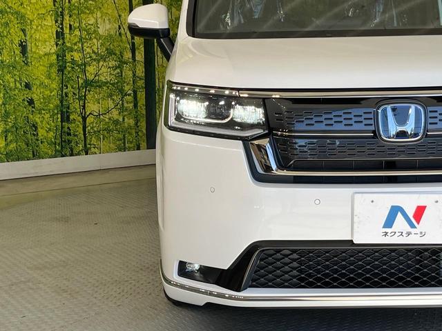 ステップワゴン ｅ：ＨＥＶスパーダ　登録済未使用車　両側電動ドア　純正１１型ナビ　バックカメラ　ホンダセンシング　アダプティブクルーズ　電動リアゲート　ハーフレザーシート　シートヒーター　コーナーセンサー　スマートキー　ＬＥＤヘッド（29枚目）