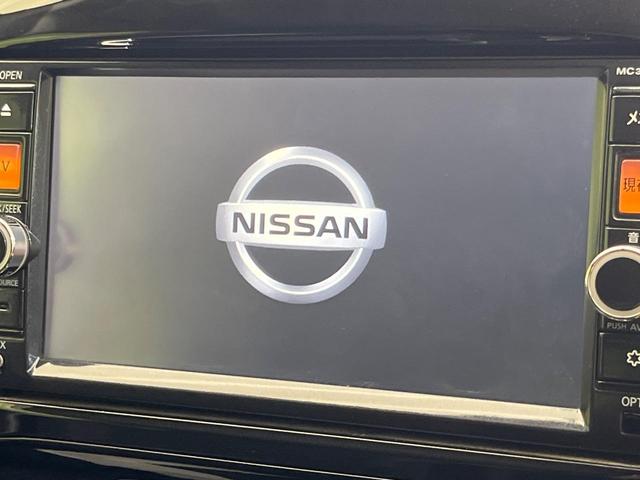 ジューク 15RX 純正ナビ バックカメラ 禁煙車 スマートキー HIDヘッド ETC オートライト オートエアコン Bluetooth再生 革巻きステアリング アイドリングストップ(3枚目)