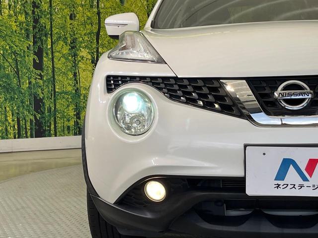 ジューク 15RX 純正ナビ バックカメラ 禁煙車 スマートキー HIDヘッド ETC オートライト オートエアコン Bluetooth再生 革巻きステアリング アイドリングストップ(12枚目)