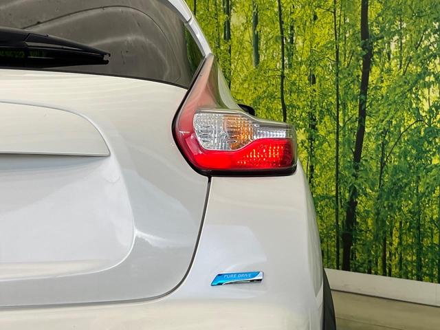 ジューク 15RX 純正ナビ バックカメラ 禁煙車 スマートキー HIDヘッド ETC オートライト オートエアコン Bluetooth再生 革巻きステアリング アイドリングストップ(29枚目)