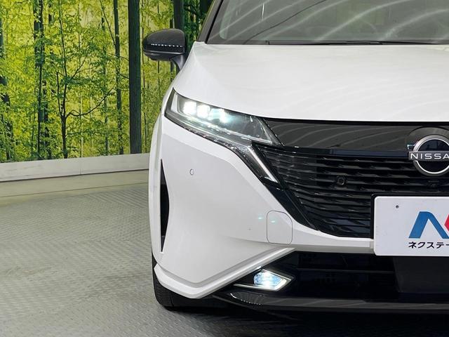 オーラ Ｇ　純正９インチナビ　全周囲カメラ　ＢＯＳＥサウンド　プロパイロット　２トーンカラー　インテリジェントエマージェンシーブレーキ　禁煙車　ハーフレザーシート　コーナーセンサー　スマートキー　ＬＥＤヘッド（12枚目）