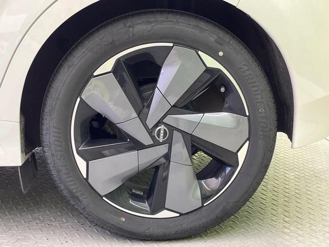 オーラ Ｇ　純正９インチナビ　全周囲カメラ　ＢＯＳＥサウンド　プロパイロット　２トーンカラー　インテリジェントエマージェンシーブレーキ　禁煙車　ハーフレザーシート　コーナーセンサー　スマートキー　ＬＥＤヘッド（58枚目）