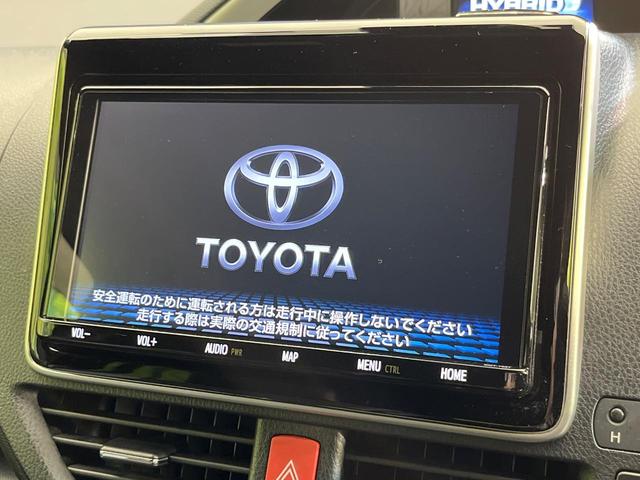 ヴォクシー ハイブリッドZS 煌III 両側電動ドア 純正9型ナビ 後席モニター バックカメラ セーフティセンス 禁煙車 ハーフレザーシート シートヒーター ドラレコ コーナーセンサー スマートキー LEDヘッド ETC クルコン(4枚目)
