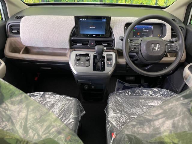 フリード エアー 登録済未使用車 両側電動ドア バックカメラ ホンダセンシング アダプティブクルーズ コーナーセンサー スマートキー LEDヘッド 純正8型ディスプレイオーディオ オートハイビーム 車線逸脱警報(2枚目)