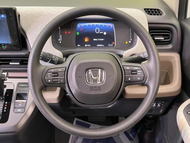 フリード エアー 登録済未使用車 両側電動ドア バックカメラ ホンダセンシング アダプティブクルーズ コーナーセンサー スマートキー LEDヘッド 純正8型ディスプレイオーディオ オートハイビーム 車線逸脱警報(12枚目)