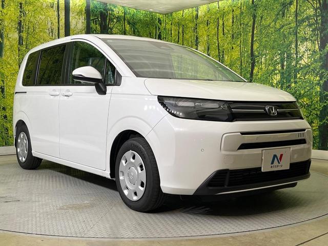 フリード エアー 登録済未使用車 両側電動ドア バックカメラ ホンダセンシング アダプティブクルーズ コーナーセンサー スマートキー LEDヘッド 純正8型ディスプレイオーディオ オートハイビーム 車線逸脱警報(25枚目)