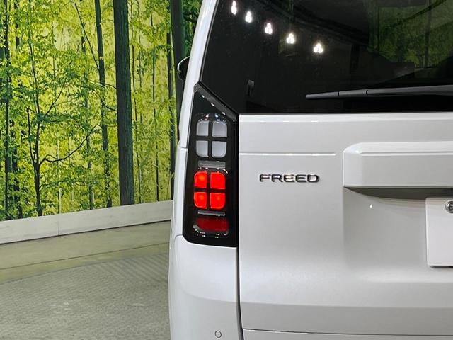 フリード エアー 登録済未使用車 両側電動ドア バックカメラ ホンダセンシング アダプティブクルーズ コーナーセンサー スマートキー LEDヘッド 純正8型ディスプレイオーディオ オートハイビーム 車線逸脱警報(30枚目)