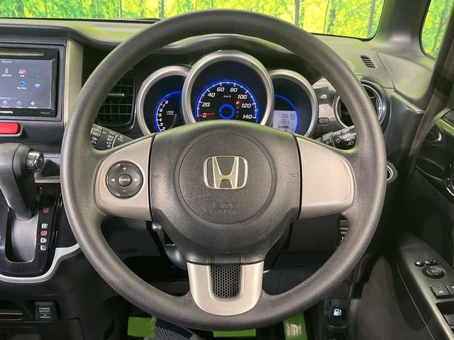 Ｎ－ＢＯＸ Ｇ・Ｌパッケージ　電動スライドドア　禁煙車　スマートキー　ＨＩＤヘッド　ディスプレイオーディオ　純正１４インチアルミ　オートライト　オートエアコン　ステアリングスイッチ　アームレスト　電動格納ミラー（11枚目）