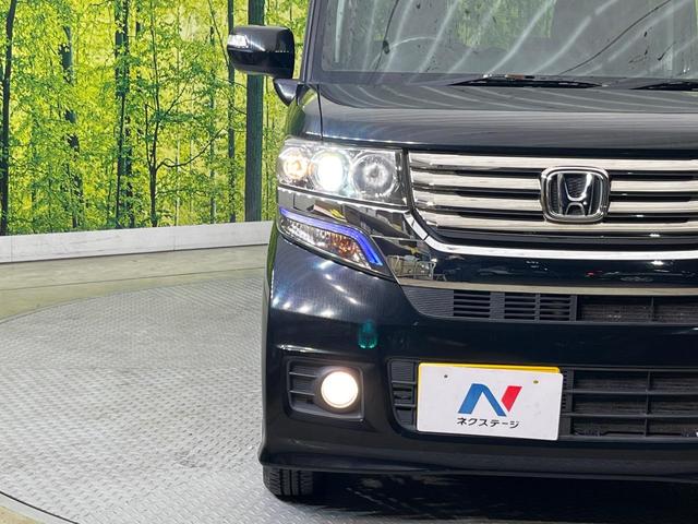 Ｎ－ＢＯＸ Ｇ・Ｌパッケージ　電動スライドドア　禁煙車　スマートキー　ＨＩＤヘッド　ディスプレイオーディオ　純正１４インチアルミ　オートライト　オートエアコン　ステアリングスイッチ　アームレスト　電動格納ミラー（12枚目）