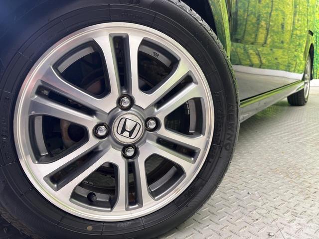 Ｎ－ＢＯＸ Ｇ・Ｌパッケージ　電動スライドドア　禁煙車　スマートキー　ＨＩＤヘッド　ディスプレイオーディオ　純正１４インチアルミ　オートライト　オートエアコン　ステアリングスイッチ　アームレスト　電動格納ミラー（13枚目）
