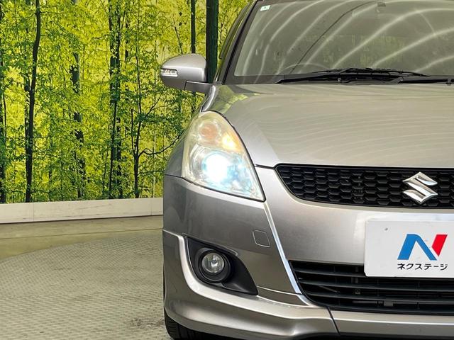 スイフト ＲＳ　ＭＴ車　禁煙車　スマートキー　ＥＴＣ　純正１６インチアルミ　オートライト　オートエアコン　ＣＤ再生　フォグライト　ドアバイザー（28枚目）