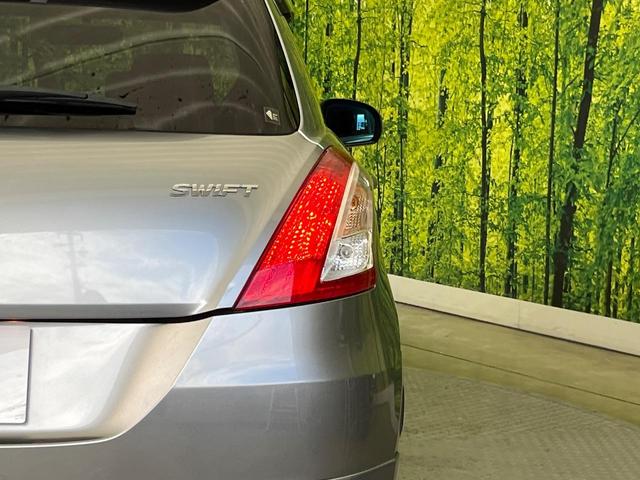 スイフト ＲＳ　ＭＴ車　禁煙車　スマートキー　ＥＴＣ　純正１６インチアルミ　オートライト　オートエアコン　ＣＤ再生　フォグライト　ドアバイザー（29枚目）
