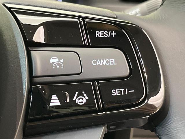 ヴェゼル ｅ：ＨＥＶ　Ｚ　登録済未使用車　純正９型ナビ　全周囲カメラ　ホンダセンシング　レーダークルーズ　電動リアゲート　ハーフレザーシート　シートヒーター　コーナーセンサー　スマートキー　ＬＥＤヘッド　ＥＴＣ２．０（5枚目）