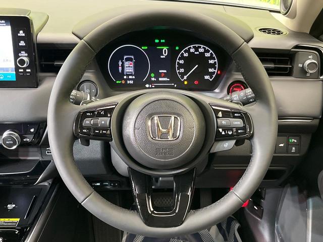 ヴェゼル ｅ：ＨＥＶ　Ｚ　登録済未使用車　純正９型ナビ　全周囲カメラ　ホンダセンシング　レーダークルーズ　電動リアゲート　ハーフレザーシート　シートヒーター　コーナーセンサー　スマートキー　ＬＥＤヘッド　ＥＴＣ２．０（11枚目）