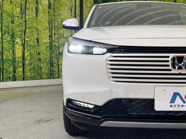 ヴェゼル ｅ：ＨＥＶ　Ｚ　登録済未使用車　純正９型ナビ　全周囲カメラ　ホンダセンシング　レーダークルーズ　電動リアゲート　ハーフレザーシート　シートヒーター　コーナーセンサー　スマートキー　ＬＥＤヘッド　ＥＴＣ２．０（28枚目）