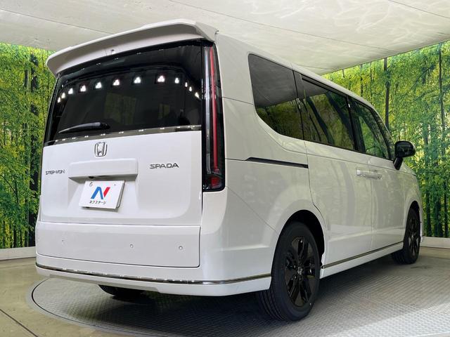 ステップワゴン スパーダ　両側電動ドア　純正１１型ナビ　バックカメラ　ホンダセンシング　レーダークルーズ　パワーバックドア　ハーフレザーシート　シートヒーター　コーナーセンサー　スマートキー　ＬＥＤヘッド　純正１６インチアルミ（18枚目）
