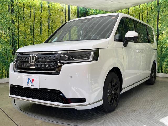 ステップワゴン スパーダ　両側電動ドア　純正１１型ナビ　バックカメラ　ホンダセンシング　レーダークルーズ　パワーバックドア　ハーフレザーシート　シートヒーター　コーナーセンサー　スマートキー　ＬＥＤヘッド　純正１６インチアルミ（25枚目）