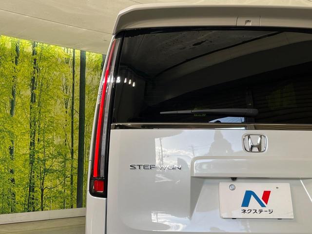ステップワゴン スパーダ　両側電動ドア　純正１１型ナビ　バックカメラ　ホンダセンシング　レーダークルーズ　パワーバックドア　ハーフレザーシート　シートヒーター　コーナーセンサー　スマートキー　ＬＥＤヘッド　純正１６インチアルミ（30枚目）