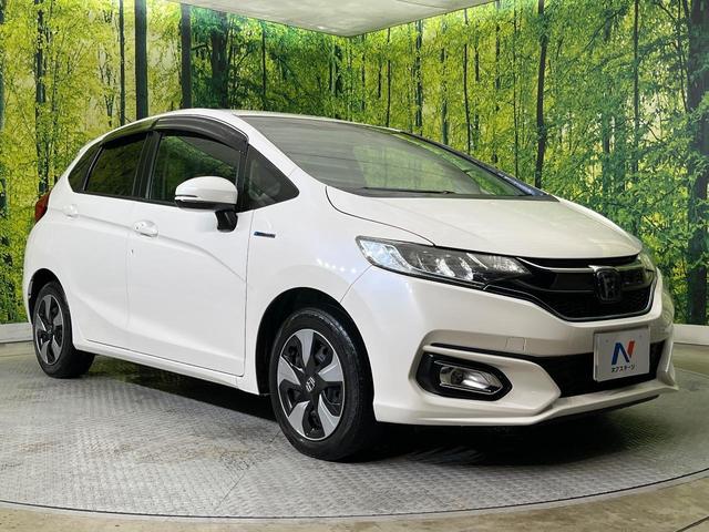 フィットハイブリッド Ｌ　ホンダセンシング　純正ＳＤナビ　バックカメラ　ホンダセンシング　アダプティブクルーズコントロール　禁煙車　ハーフレザーシート　ドラレコ　コーナーセンサー　スマートキー　ＬＥＤヘッド　ＥＴＣ　誤発進抑制機能　オートライト（16枚目）