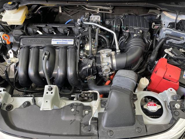 フィットハイブリッド Ｌ　ホンダセンシング　純正ＳＤナビ　バックカメラ　ホンダセンシング　アダプティブクルーズコントロール　禁煙車　ハーフレザーシート　ドラレコ　コーナーセンサー　スマートキー　ＬＥＤヘッド　ＥＴＣ　誤発進抑制機能　オートライト（18枚目）