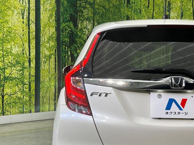 フィットハイブリッド Ｌ　ホンダセンシング　純正ＳＤナビ　バックカメラ　ホンダセンシング　アダプティブクルーズコントロール　禁煙車　ハーフレザーシート　ドラレコ　コーナーセンサー　スマートキー　ＬＥＤヘッド　ＥＴＣ　誤発進抑制機能　オートライト（29枚目）