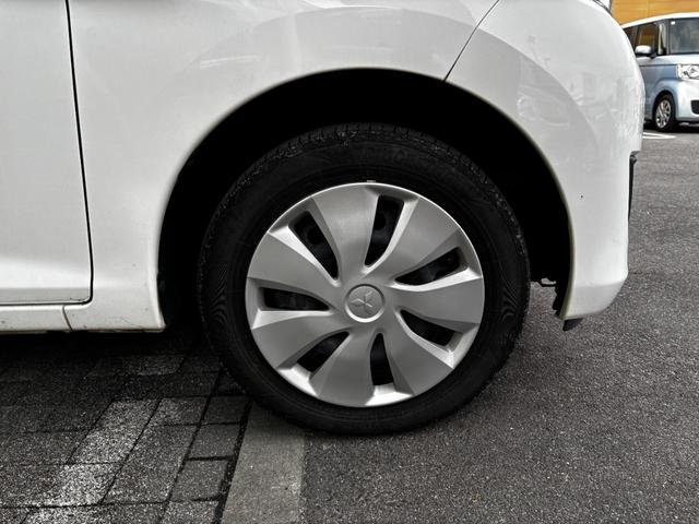 ｅＫワゴン Ｅ　車検２年　電動格納ドアミラー　ＣＤオーディオ　キーレスエントリー　横滑り防止機能　シートヒーター　マニュアルエアコン　パワーウインドウ　ベンチシート　プライバシーガラス　軽自動車　保証あり（21枚目）