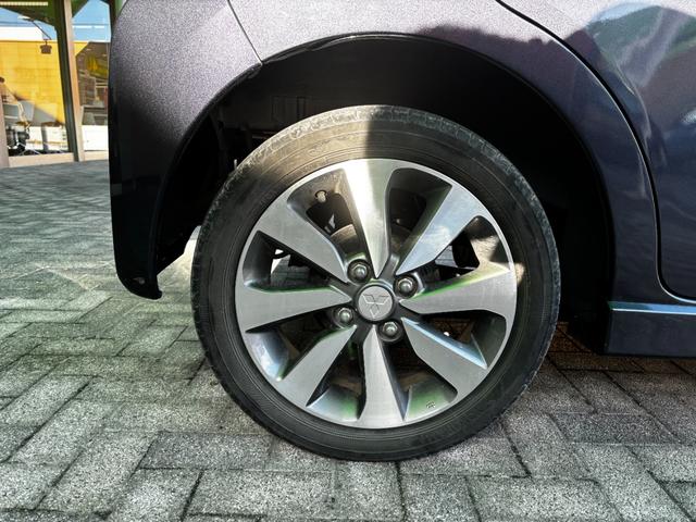 ｅＫカスタム Ｔ　車検８年１１月　電動格納ドアミラー　ＥＴＣ　スマートキー　純正アルミホイール　ベンチシート　フォグランプ　ディスチャージヘッドライト　オートエアコン　パワーウインドウ　プライバシーガラス　保証あり（22枚目）