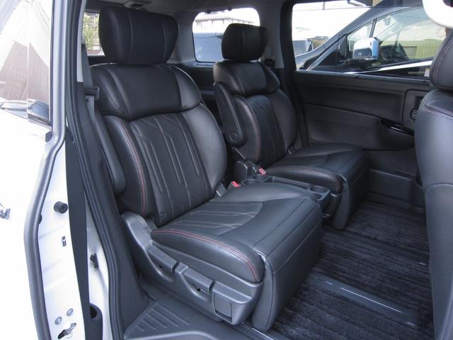 エルグランド ３５０ハイウェイスタープレミアムアーバンクロム　全ＯＰエマージェンシーブレーキ車線逸脱防止レーダークルーズ踏間違衝突防止Ｗサンルーフ純正ナビ後席ディスプレイ本革シート前後側方衝突防止アラウンドビュＭスマートミラーＣソナパワーバック両電ドア保温保冷庫（65枚目）