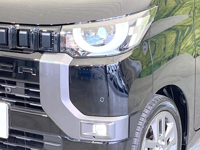 デリカミニ T プレミアム 両側電動ドア 9型ナビ 全周囲カメラ 衝突被害軽減システム レーダークルーズ 禁煙車 ハーフレザーシート ドラレコ コーナーセンサー スマートキー LEDヘッド ビルトインETC オートライト(12枚目)