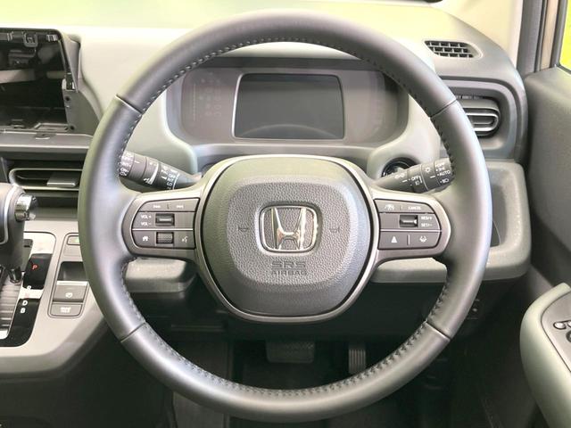 フリード e:HEVクロスター 登録済未使用車 両側電動ドア バックカメラ 衝突被害軽減システム レーダークルーズ ハーフレザーシート コーナーセンサー スマートキー LEDヘッド ルーフレール 車線逸脱警報 オートライト(12枚目)