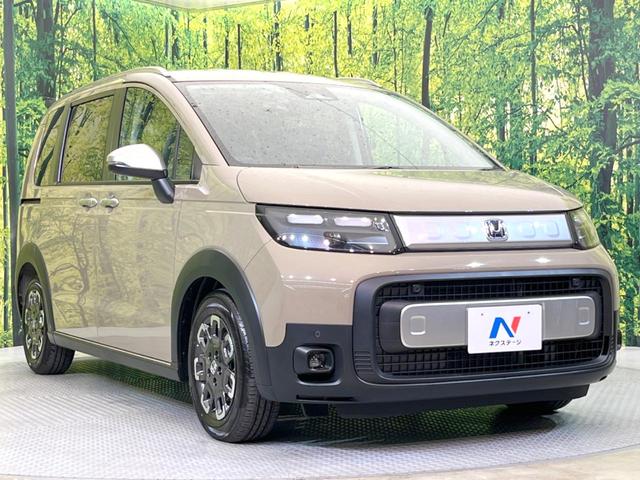 フリード e:HEVクロスター 登録済未使用車 両側電動ドア バックカメラ 衝突被害軽減システム レーダークルーズ ハーフレザーシート コーナーセンサー スマートキー LEDヘッド ルーフレール 車線逸脱警報 オートライト(17枚目)