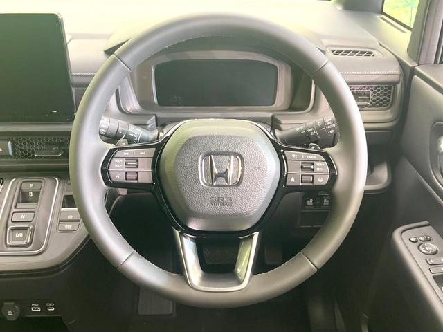 ステップワゴン e:HEVスパーダ 登録済未使用車 両側電動ドア 純正SDナビ 衝突被害軽減システム レーダークルーズ バックカメラ 電動リアゲート ハーフレザーシート コーナーセンサー LEDヘッド 車線逸脱警報 スマートキー(12枚目)