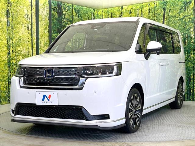 ステップワゴン e:HEVスパーダ プレミアムライン 両側電動スライド 純正11型ナビ フリップダウン 全周囲カメラ ホンダセンシング レーダークルーズ 禁煙車 パワーバックドア ハーフレザーシート ドラレコ コーナーセンサー スマートキー LEDヘッド(57枚目)