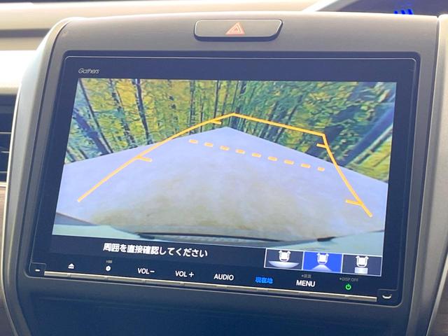 フリードハイブリッド ハイブリッド・Ｇホンダセンシング　両側電動ドア　純正９型ナビ　バックカメラ　衝突被害軽減システム　レーダークルーズ　禁煙車　ドラレコ　スマートキー　ＬＥＤヘッド　ＥＴＣ　車線逸脱警報　オートライト　オートエアコン　Ｂｌｕｅｔｏｏｔｈ（4枚目）