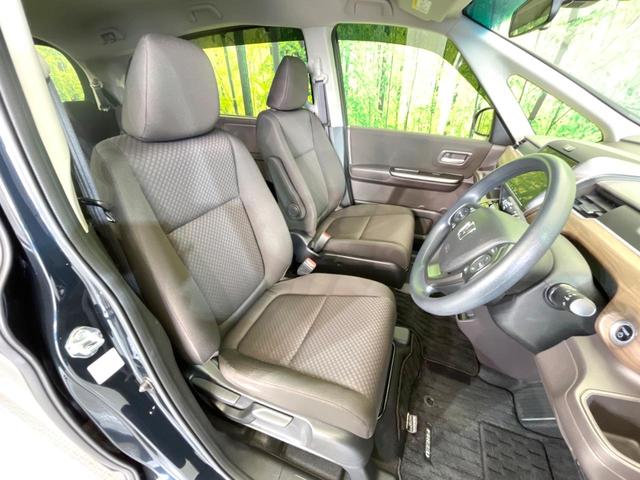 フリードハイブリッド ハイブリッド・Ｇホンダセンシング　両側電動ドア　純正９型ナビ　バックカメラ　衝突被害軽減システム　レーダークルーズ　禁煙車　ドラレコ　スマートキー　ＬＥＤヘッド　ＥＴＣ　車線逸脱警報　オートライト　オートエアコン　Ｂｌｕｅｔｏｏｔｈ（8枚目）