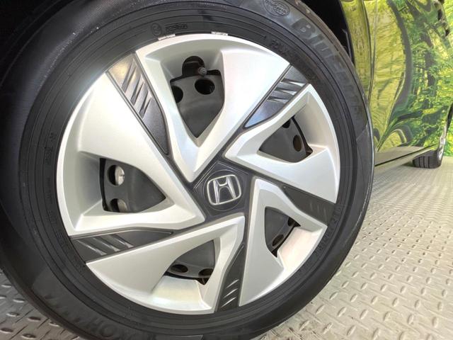 フリードハイブリッド ハイブリッド・Ｇホンダセンシング　両側電動ドア　純正９型ナビ　バックカメラ　衝突被害軽減システム　レーダークルーズ　禁煙車　ドラレコ　スマートキー　ＬＥＤヘッド　ＥＴＣ　車線逸脱警報　オートライト　オートエアコン　Ｂｌｕｅｔｏｏｔｈ（14枚目）