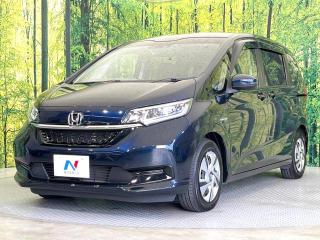 フリードハイブリッド ハイブリッド・Ｇホンダセンシング　両側電動ドア　純正９型ナビ　バックカメラ　衝突被害軽減システム　レーダークルーズ　禁煙車　ドラレコ　スマートキー　ＬＥＤヘッド　ＥＴＣ　車線逸脱警報　オートライト　オートエアコン　Ｂｌｕｅｔｏｏｔｈ（32枚目）