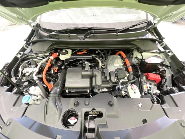 ヴェゼル ｅ：ＨＥＶ　Ｚ　登録済未使用車　純正９インチナビ　全周囲カメラ　ＥＴＣ２．０　ホンダセンシング　レーダークルーズ　パワーバックドア　Ｂｌｕｅｔｏｏｔｈ　ブラインドスポットモニター　前席シートヒーター（18枚目）