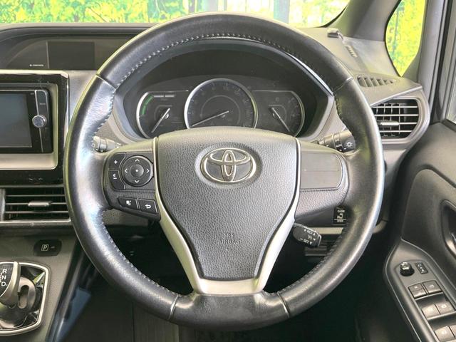 ヴォクシー ハイブリッドＶ　純正ナビ　バックカメラ　両側電動スライド　禁煙車　シートヒーター　ドラレコ　スマートキー　ＬＥＤヘッド　ＥＴＣ　純正１５インチＡＷ　オートライト　デュアルエアコン　リアエアコン　Ｂｌｕｅｔｏｏｔｈ再生（12枚目）