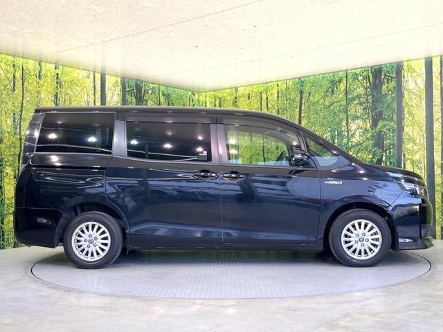 ヴォクシー ハイブリッドＶ　純正ナビ　バックカメラ　両側電動スライド　禁煙車　シートヒーター　ドラレコ　スマートキー　ＬＥＤヘッド　ＥＴＣ　純正１５インチＡＷ　オートライト　デュアルエアコン　リアエアコン　Ｂｌｕｅｔｏｏｔｈ再生（28枚目）