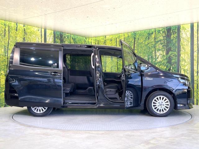 ヴォクシー ハイブリッドＶ　純正ナビ　バックカメラ　両側電動スライド　禁煙車　シートヒーター　ドラレコ　スマートキー　ＬＥＤヘッド　ＥＴＣ　純正１５インチＡＷ　オートライト　デュアルエアコン　リアエアコン　Ｂｌｕｅｔｏｏｔｈ再生（31枚目）