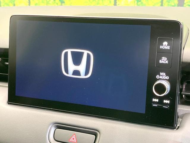 ヴェゼル ｅ：ＨＥＶ　Ｚ　登録済未使用車　純正９型ナビ　全周囲カメラ　ＥＴＣ　衝突軽減　レーダークルーズコントロール　ＢＳＭ　パワーバックドア　シートヒーター　オートエアコン　プッシュスタート（3枚目）