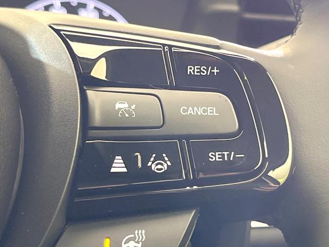 ヴェゼル ｅ：ＨＥＶ　Ｚ　登録済未使用車　純正９型ナビ　全周囲カメラ　ＥＴＣ　衝突軽減　レーダークルーズコントロール　ＢＳＭ　パワーバックドア　シートヒーター　オートエアコン　プッシュスタート（6枚目）