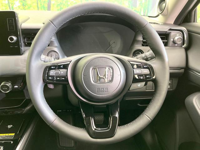 ヴェゼル ｅ：ＨＥＶ　Ｚ　登録済未使用車　純正９型ナビ　全周囲カメラ　ＥＴＣ　衝突軽減　レーダークルーズコントロール　ＢＳＭ　パワーバックドア　シートヒーター　オートエアコン　プッシュスタート（11枚目）