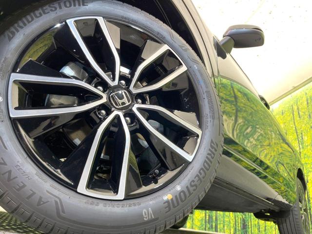 ヴェゼル ｅ：ＨＥＶ　Ｚ　登録済未使用車　純正９型ナビ　全周囲カメラ　ＥＴＣ　衝突軽減　レーダークルーズコントロール　ＢＳＭ　パワーバックドア　シートヒーター　オートエアコン　プッシュスタート（13枚目）