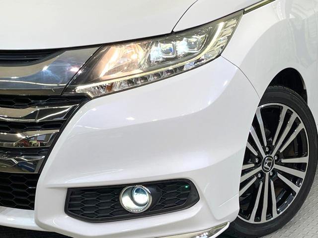 オデッセイ アブソルート・ＥＸ　後席モニター　両側電動ドア　全周囲カメラ　レーダークルーズ　ハーフレザーシート　パワーシート　コーナーセンサー　スマートキー　ＬＥＤヘッド　ビルトインＥＴＣ　純正１８インチアルミ　オートライト（12枚目）