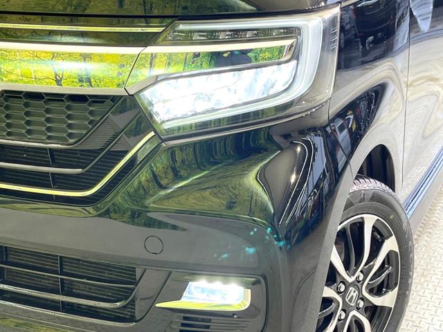 N-BOXカスタム G・Lホンダセンシング SDナビ 電動スライドドア バックカメラ 衝突軽減 レーダークルーズ 禁煙車 ドラレコ スマートキー LEDヘッド ビルトインETC 純正14インチアルミ オートハイビーム 車線逸脱警報(12枚目)