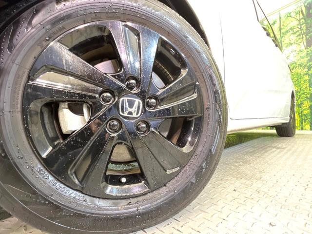 フリードハイブリッド ハイブリッド・Ｇブラックスタイル　両側電動ドア　純正ＳＤナビ　バックカメラ　衝突被害軽減システム　禁煙車　ドラレコ　スマートキー　ＬＥＤヘッド　ビルトインＥＴＣ　純正１５インチアルミ　車線逸脱警報　オートライト　オートエアコン（13枚目）